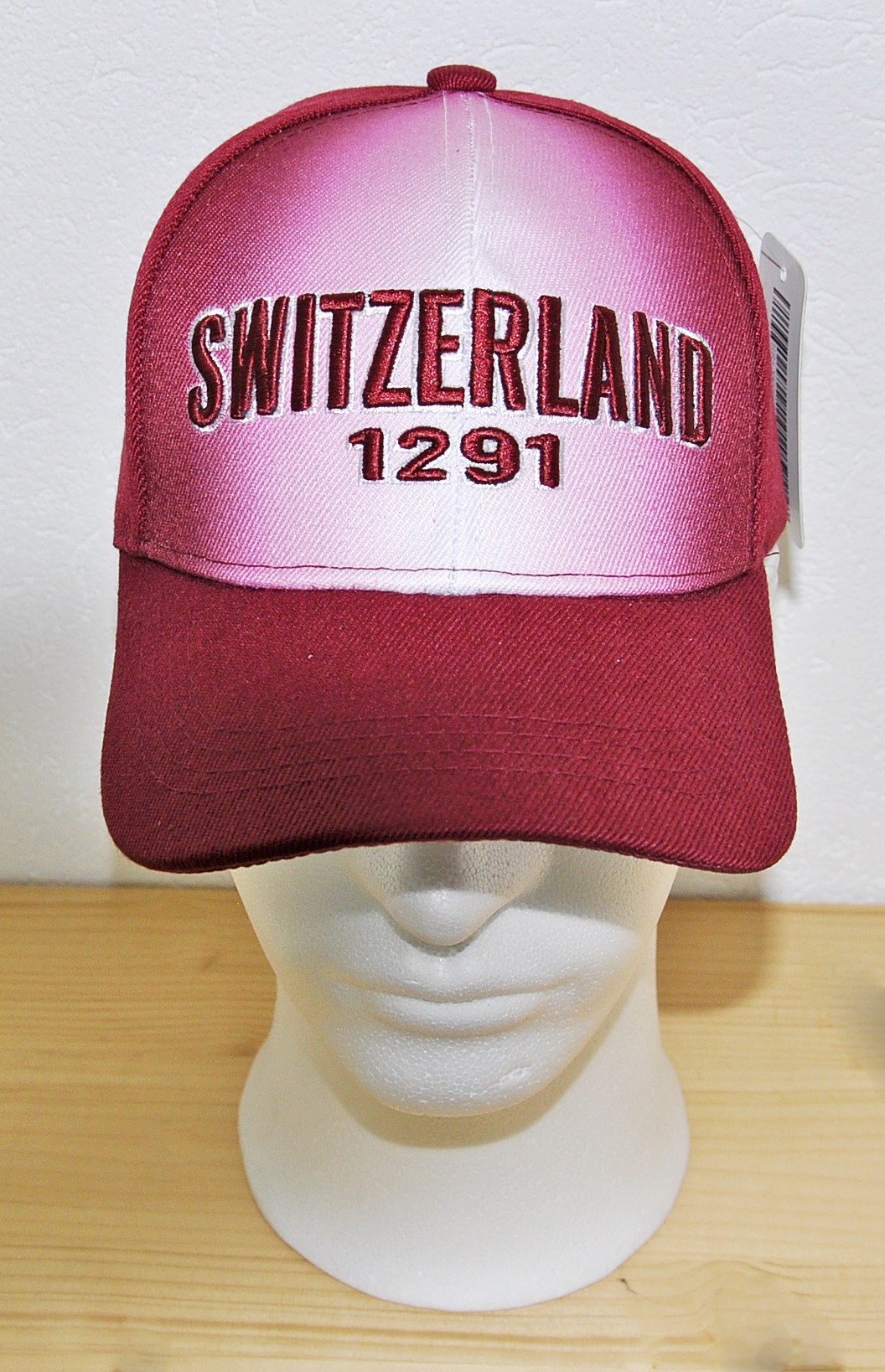 Image of Cap Switzerland wine rot